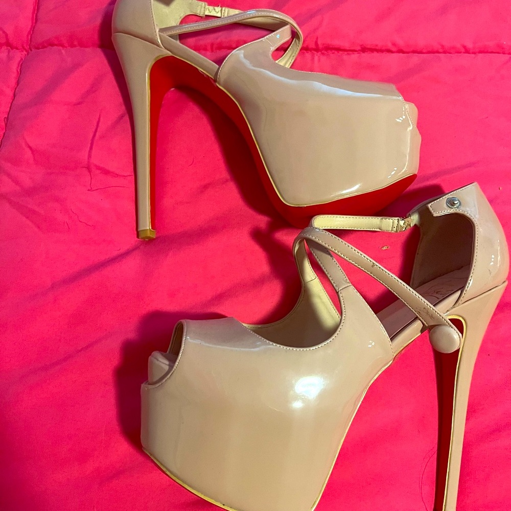 Beautiful red bottom extremely high platform heels. So sexy size 42 beige.